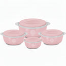 Set of four pink food storage containers with lids on a white background
