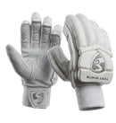 A pair of white cricket gloves shown from both the back of the hand and the palm side, displayed against a dark gray studio background on a light gray surface. The gloves feature textured leather panels, finger perforations, and a visible shield logo with the text 'TEST WHITE' on the back.