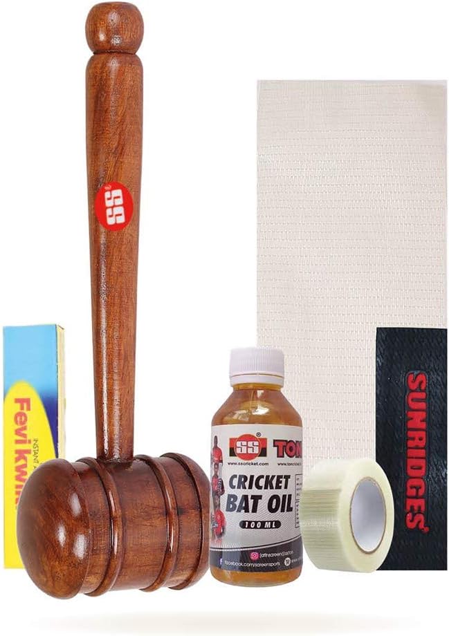 SS cricket bat care kit including a bat, cricket tape, bat oil, and a cleaning cloth.