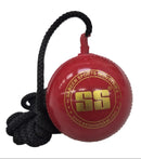 Red cricket ball with a black rope on a white background