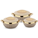 Set of three ceramic dishes with gold lids on a white background