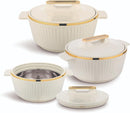 Set of beige cookware with gold trim on a white background