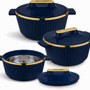 Set of blue cookware with gold trim on a white background