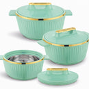 Set of four green cookware pieces with gold accents on a white background