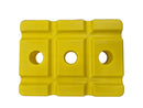 A bright yellow molded plastic component with a grid-like textured surface and three circular holes, photographed from above on a gray background.