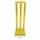 Three yellow cricket wickets with the word 'TABAKH' printed vertically on each, mounted on a square base. A dimension arrow at the bottom indicates the width as 11.