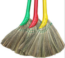 Three brooms with green, red, and yellow handles on a white background.