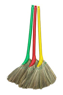 Three brooms with green, red, and yellow handles.
