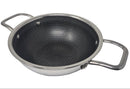 Black wok with a textured surface and metal handles on a white background