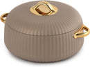 Brown cookware with gold handles and lid knob on a white background