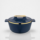 Blue ceramic cookware with gold trim on a white background
