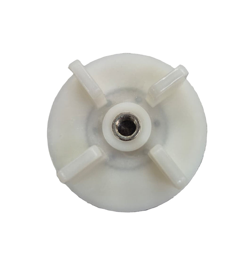 White plastic wheel with central hub on a white background