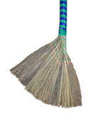 Broom with a green handle on a white background