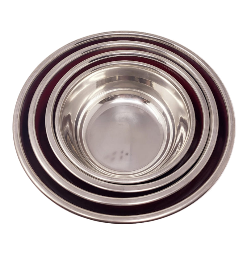 Set of four nested metal bowls on a white background