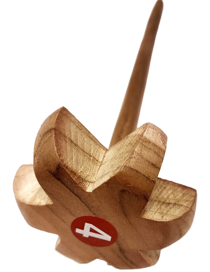 Wooden ladle with a red circle and number 4 on a white background
