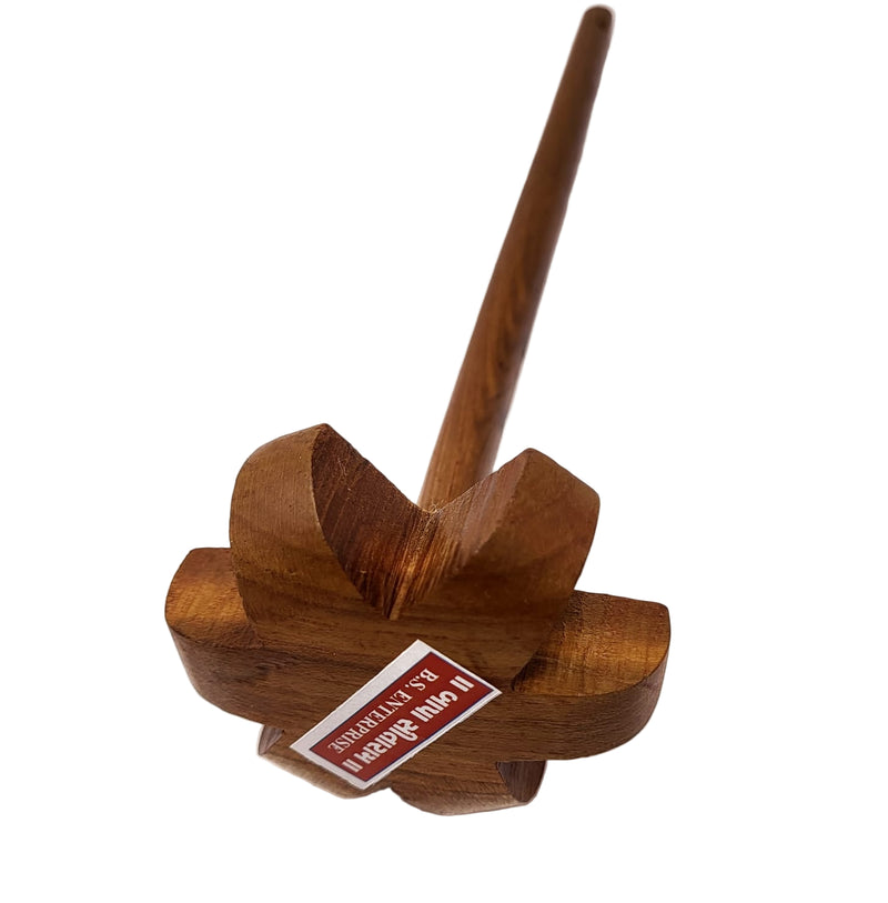 Wooden top with a label on a white background